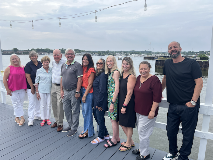 Port Washington BID board members on a dock.