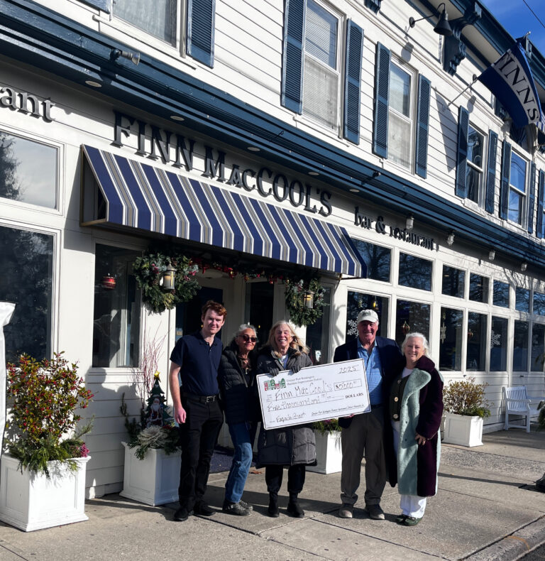 : Finn MacCool’s receives grant funding for façade improvements. Pictured:  Connor, Cindie Leigh, Bonnie Doran, Connie O’Reilly, and Holly Byrne.